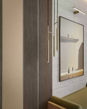 Brushed bronze LED profile accent trim in a lobby